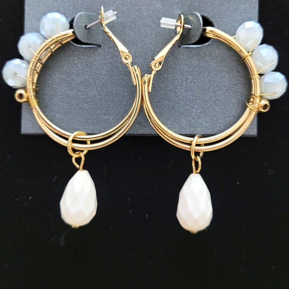 Hoops with faceted Grey stones Goldtone